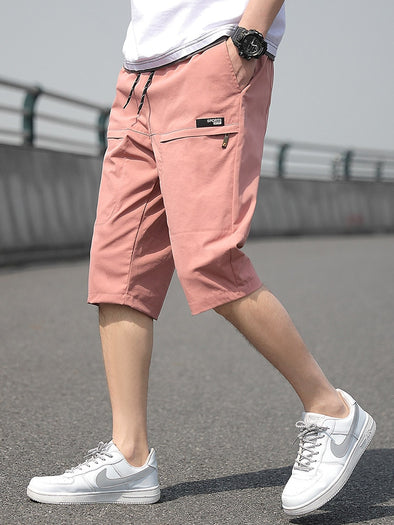 Sweatpants  Summer Wear  Summer Capris Pants  Straight Fit  Plus Size  Men's Calf-Length Shorts  Loose Casual Style  Fashionable and Functional  Cropped Trousers  Cool and Comfortable  Casual and Relaxed Look.  Breathable Fabric