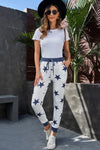 july 4th sale  clothing for July 4th  Versatile Lounge or Streetwear  Trendy Star Print Design  Starry Night Joggers  Standout Starry Joggers  Ship From Overseas  Expressive Celestial Fashion  Effortlessly Cool and Cozy  Drawstring Detail for Adjustable Fit  Cosmic Chic Bottoms  Comfortable and Stylish jogger  Celestial Style Staple